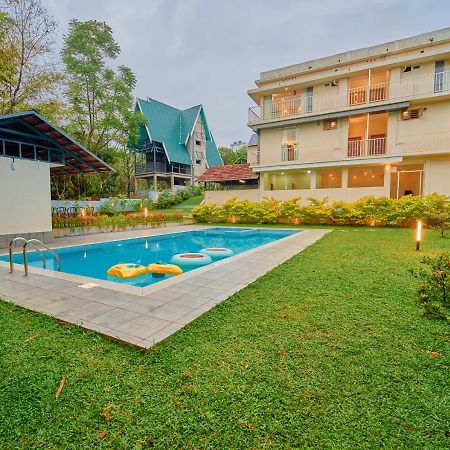 Glen Castle Vagamon Pool Resort By Voye Homes Exteriör bild