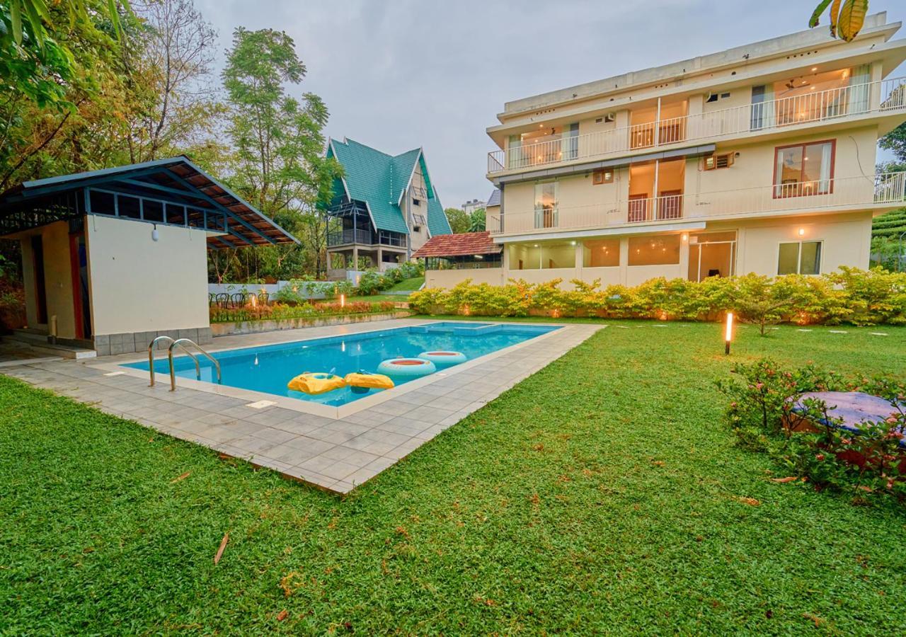 Glen Castle Vagamon Pool Resort By Voye Homes Exteriör bild