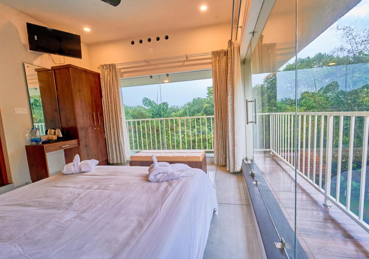 Glen Castle Vagamon Pool Resort By Voye Homes Exteriör bild