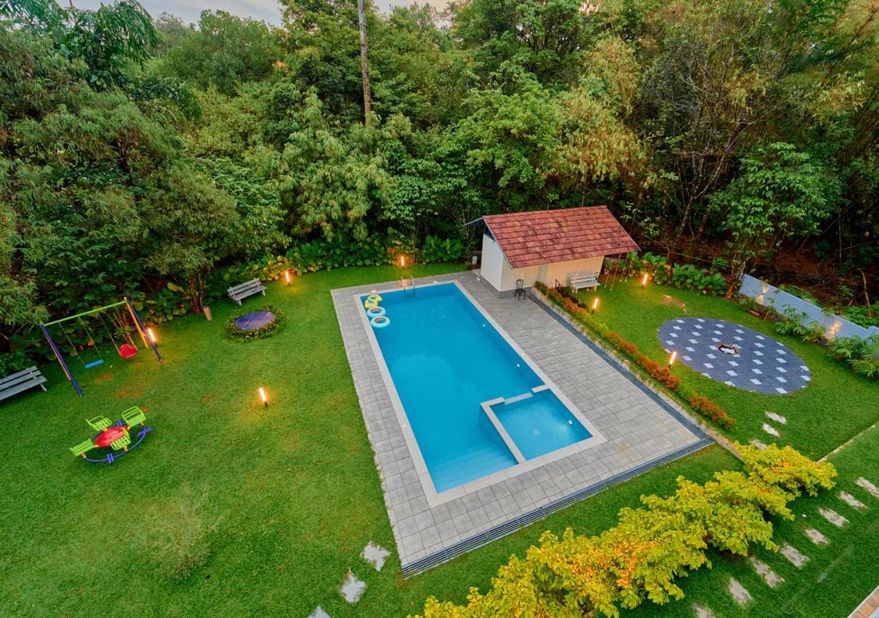 Glen Castle Vagamon Pool Resort By Voye Homes Exteriör bild